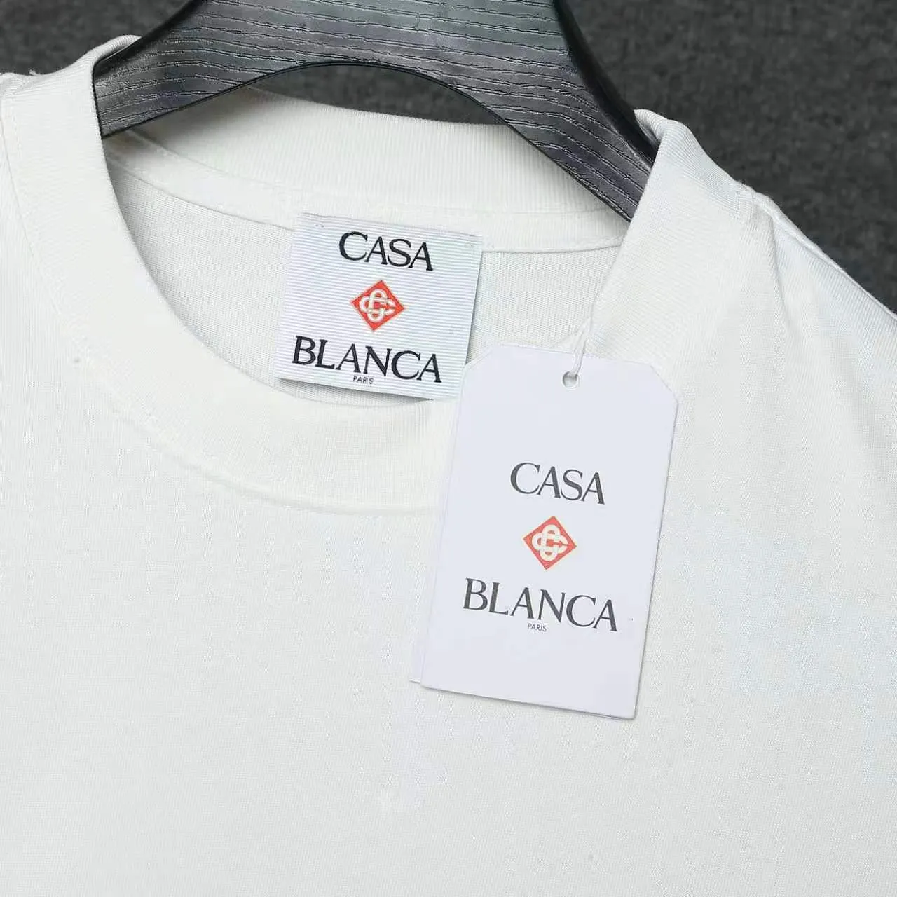 26ss CASABLANCA original printing process short-sleeved T-shirt original development using high-density double yarn pure cotton fabric upper body soft and comfortable color Black White Dark Green color Orange Pink Blue Royal Blue color cigarette powder 8 colors Sizes S M L XL